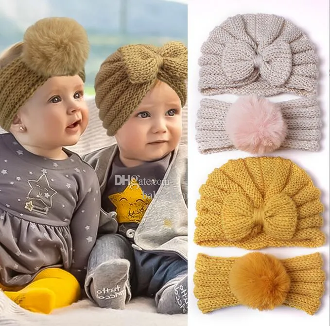冬の編み幼児ターバン弓の帽子2ピース/セット幼児の子供の子供ビーニーキャップ新生児赤ちゃんかぎ針編みの帽子ベイ​​ビーニットボウノットハット写真アクセサリー