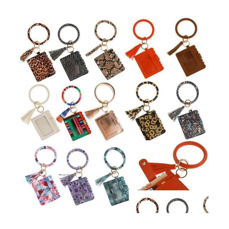 40 Styles Pu Leather Leopard Tassel Armband Keychain Bags ID Card Bag Leathers Bangle Walls Keyring Wristlet Handväska för Woman Drop Deliv
