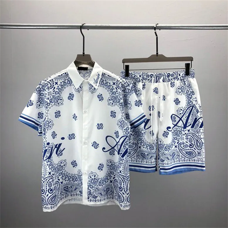 남성용 플러스 티 폴로 2023 여름 새로운 패션 승무원 목 티셔츠 면화 셔츠 하와이 비치 프린트 셔츠 반바지 스포츠 정장 K0211