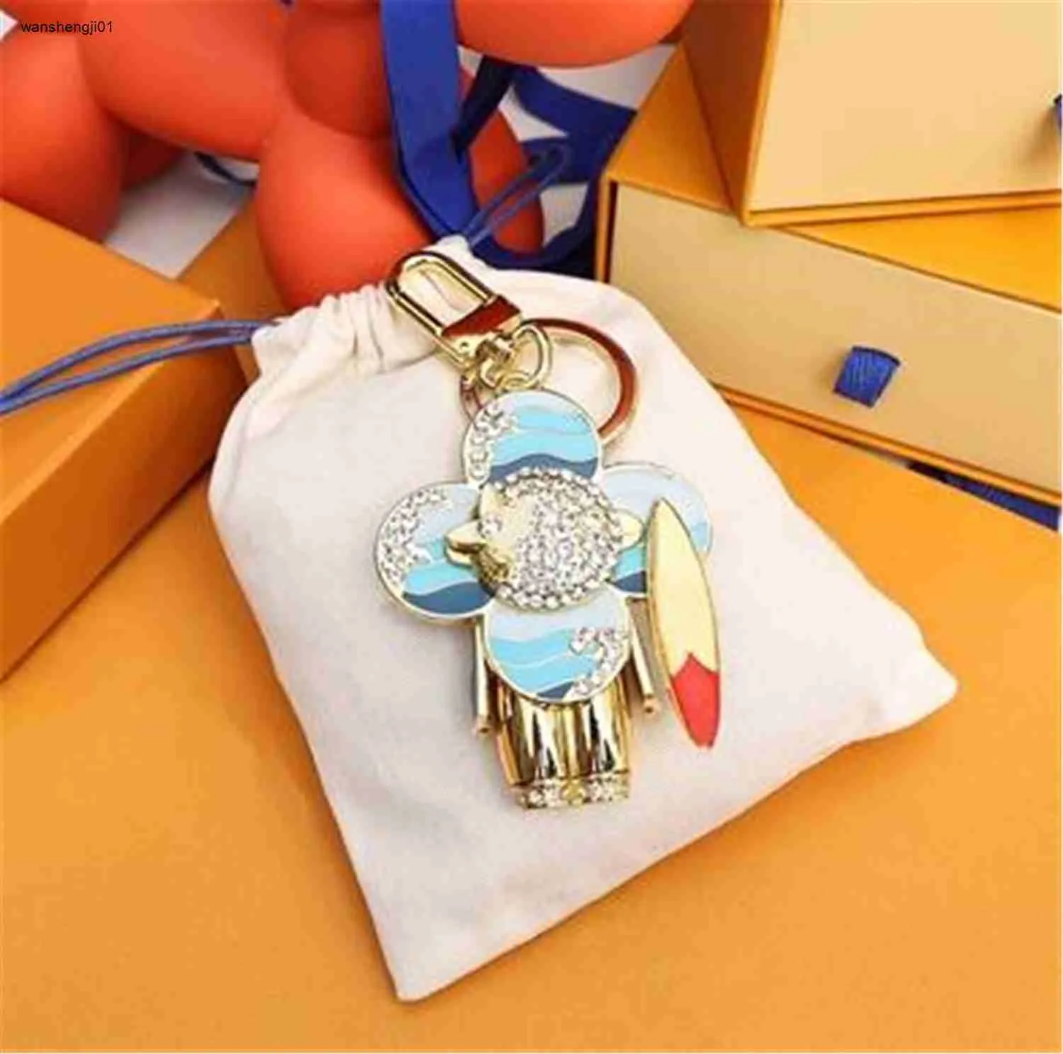 23ss fashion Keychain Designer Sunflower Key Chain Men Car Keyring Women Buckle Keychains Bags Pendant Exquisite Gift With Box And Dustbag