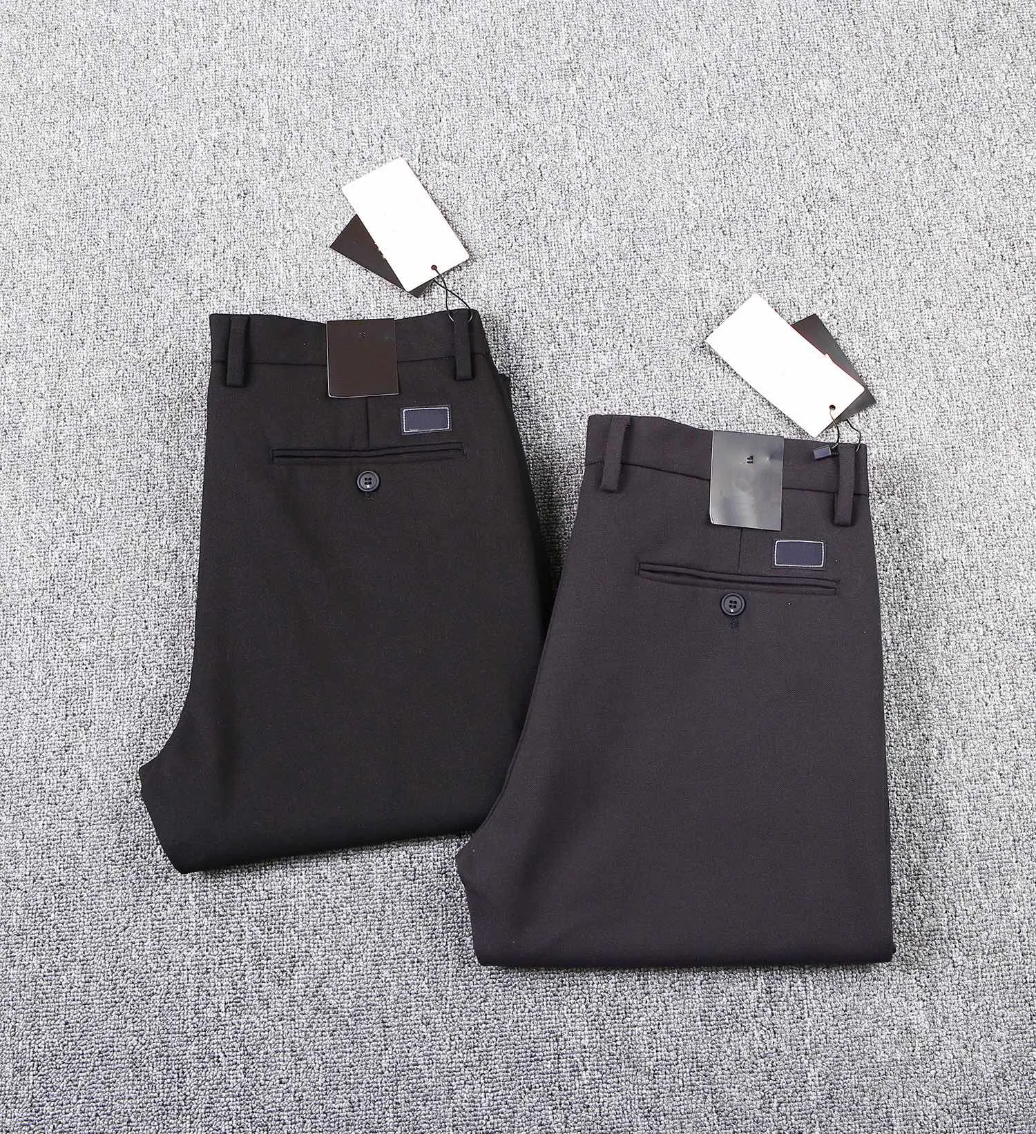 Pantalons décontractés d'affaires haut de gamme pour hommes automne hiver nouveau matériau extensible pantalon crayon de couleur unie marque de luxe pantalon de créateur haut de gamme