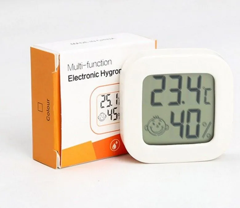 Household indoor high-precision digital temperature and hygrometer instrument with smiling face electronic temperature and hygrometer manufa