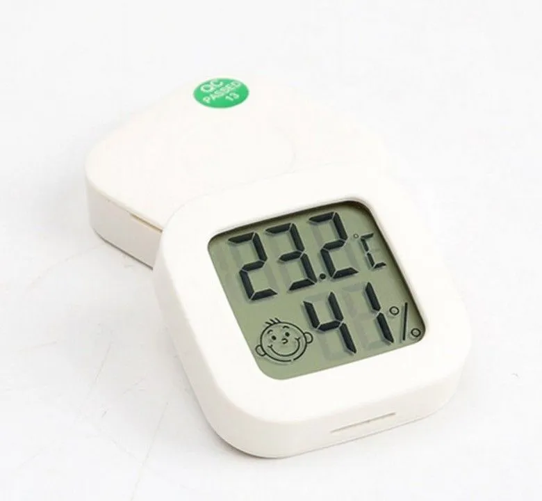 Household indoor high-precision digital temperature and hygrometer instrument with smiling face electronic temperature and hygrometer manufa