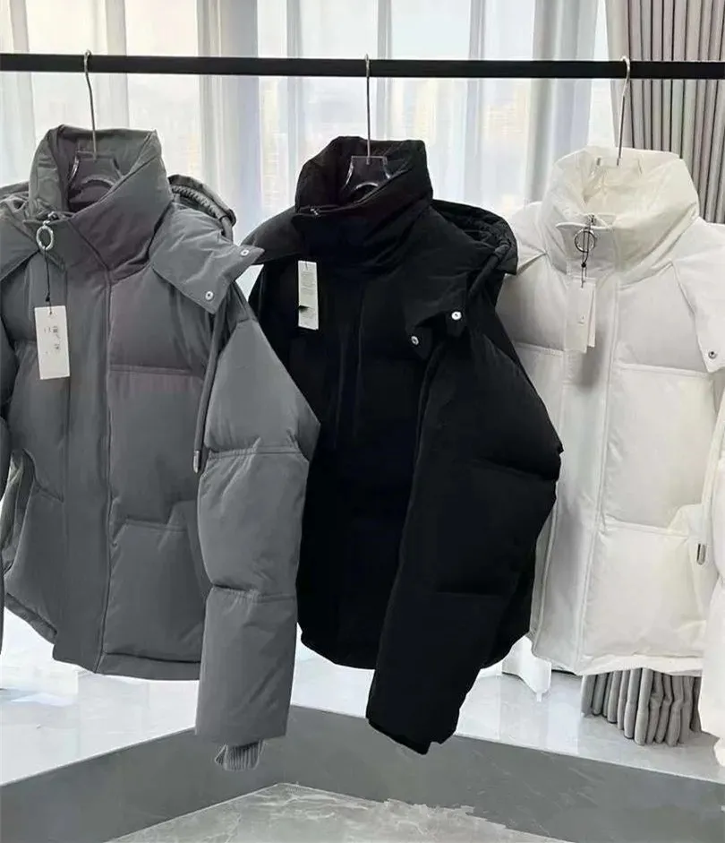 Mens Puffy Jackets Coat Classic co-märkesdesigner Fashion Parker Winter Jacket Kvinnor utomhus varma varma och fluffiga kläder för kopplingsstorlek m till xxl