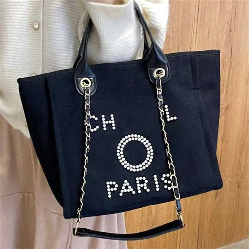 Billiga 80% rabatt på lyxiga kvinnors klassiska handväskor Canvas Beach Bag Tote Handväskor Fashion Kvinna Stor kapacitet Små kedjepaket Big Crossbody Handbag Vbly Code 561