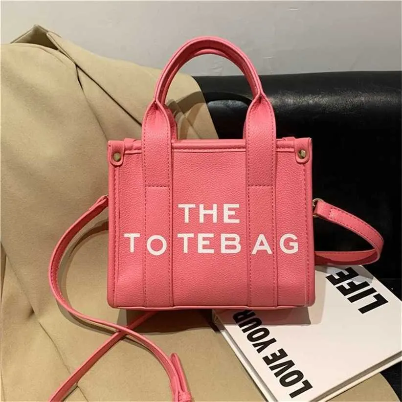 Mini tote feminino 2023 nova tendência moda bolsa júnior de alta qualidade crossbody saco code11