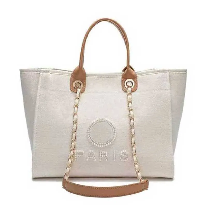 Borsa da spiaggia in tela a mano da donna classica di lusso Borse a mano Zaini grandi Capacità Confezioni a catena piccola Borsa a tracolla grande 5P4I DR1R H90