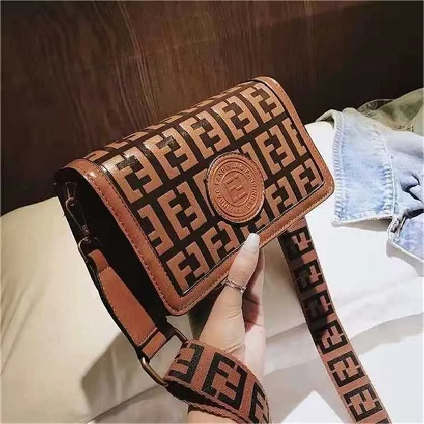 Bolsa Mori feminina textura de camada dupla único pequeno cinto largo mensageiro código 57