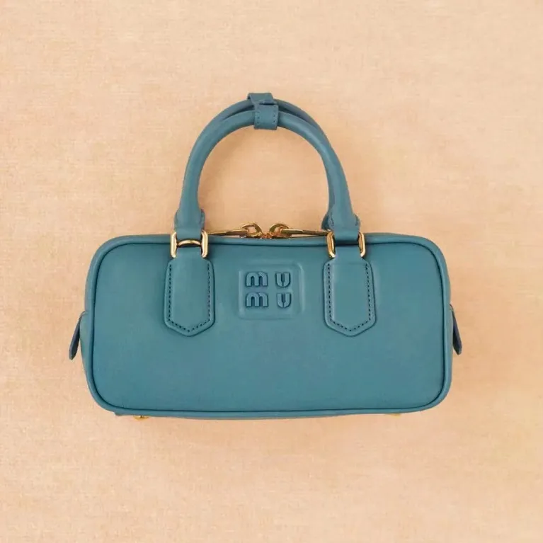 2023 nieuwe luxe Miui Arcadie Lolita tas met schouderbanden reispochette dames heren clutch bags cross body lederen bakken handtassen designer bagage bowlingtassen