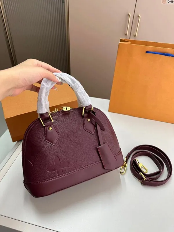 Designer sadel väska lyx axelväskor kvinnor handväska mode tygväska lyxiga crossbody väska vinröd pursar lady shopping väskor blomma tryckt handväska 3 färg