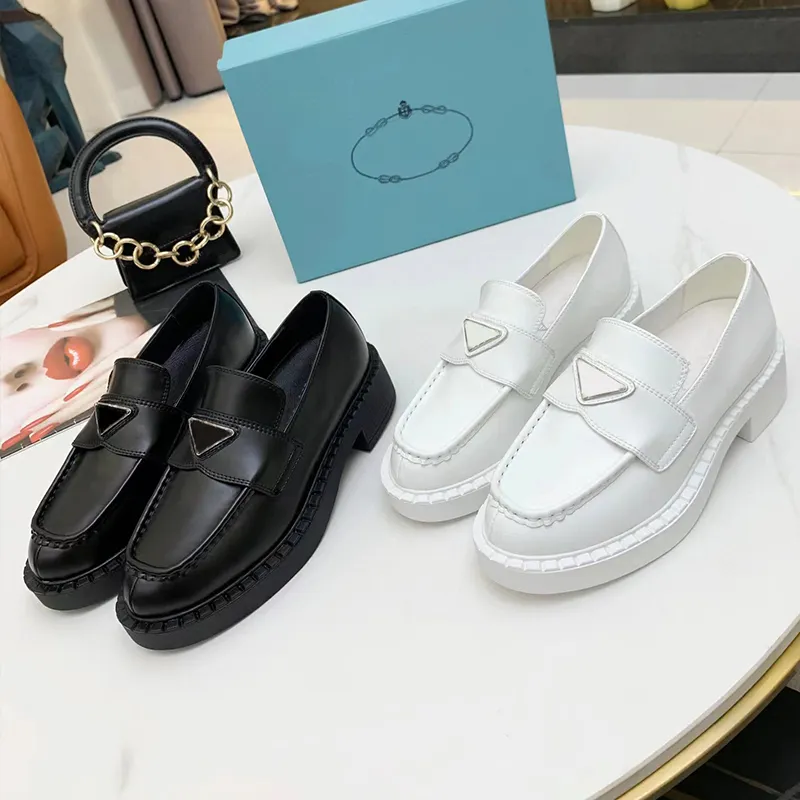 Scarpe bianche e nere deals eleganti