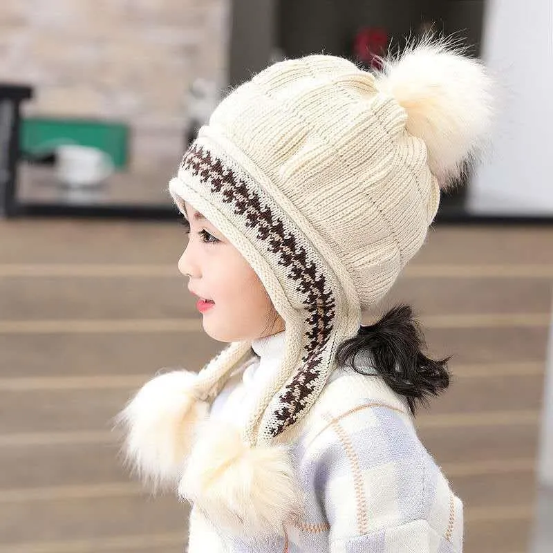 Cappelli con berretti con pompon lavorati a maglia per bambini firmati con fodera calda 3-12 anni Cappello invernale con scaldino per orecchie per bambini Cappello con pom adorabile Berretto da neve