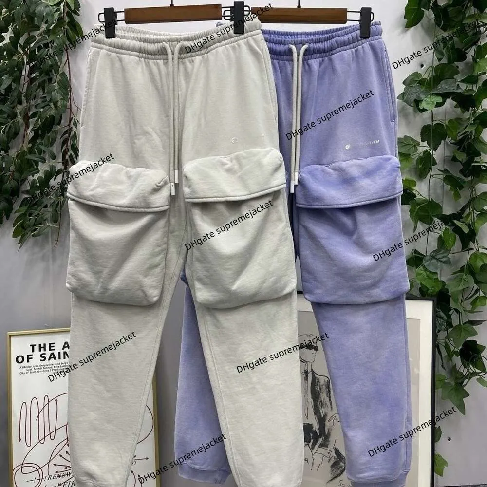 Versione alta Pantaloni casual bianchi di marca Off autunno e inverno nuovi leggings tridimensionali con borsa volante moda pantaloni da strada per uomo e donna