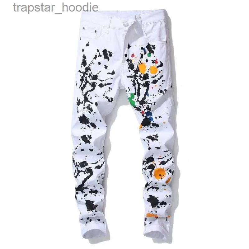 Jeans pour hommes Hommes Pantalons blancs imprimés Designer Graffito Splash Ink Peinture Couleur Street Fashion Cool Pantalon en coton unique pour hommes L230918