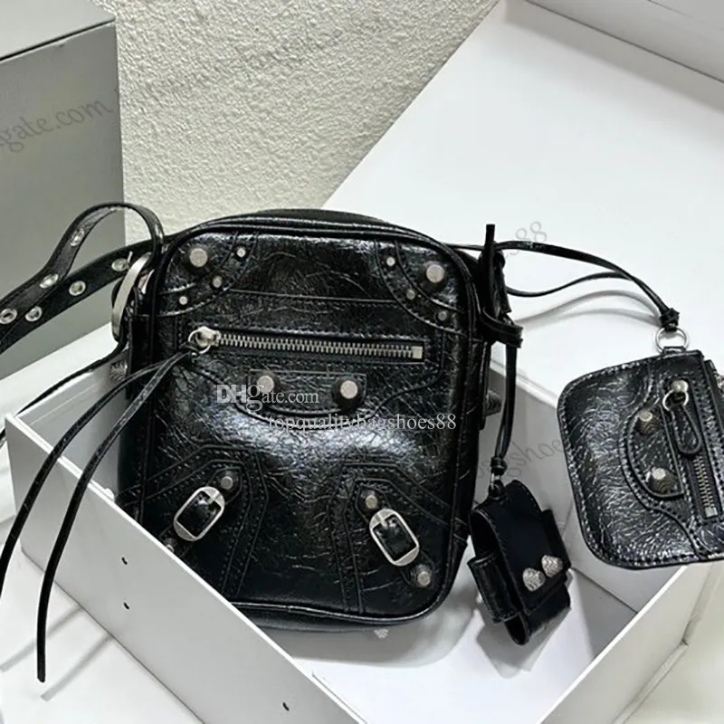 Le Cagole Mens XS Flap Bag In Black Arena Leather With Aged Le Cagole Mens XS Flap Bag In Black Arena Leather With Aged