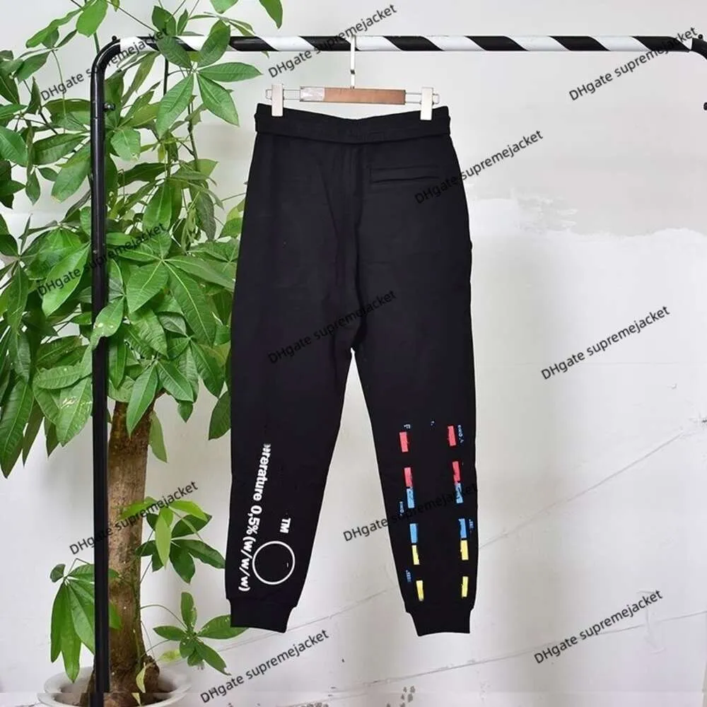 Hoge versie van merk witte herenbroek Mode nieuwe bedrukte pijlpaar trainingsbroek damesleggings casual beschermende kleding