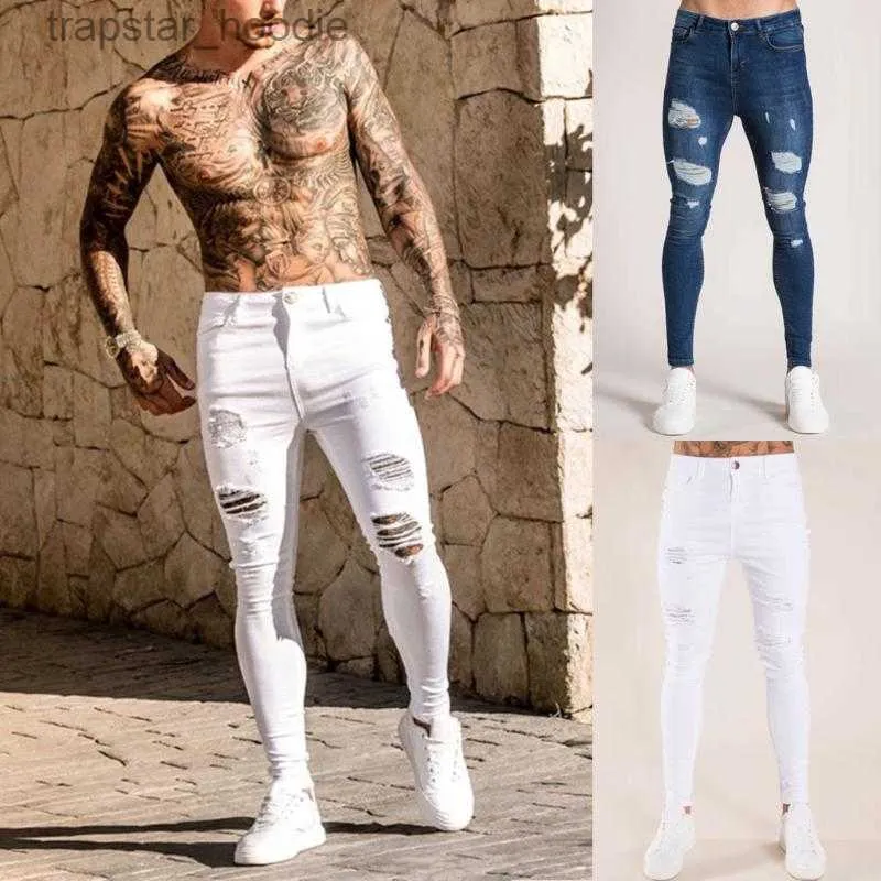 Jeans pour hommes Hommes Solid Color Jeans Nouvelle Mode Slim Crayon Pantalon Sexy Casual Trou Ripped Design Streetwear Cool Designer Blanc L230918