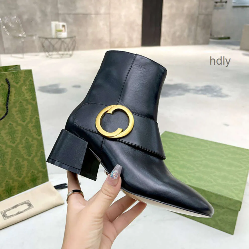 Ladies black mid top heel ankle boots