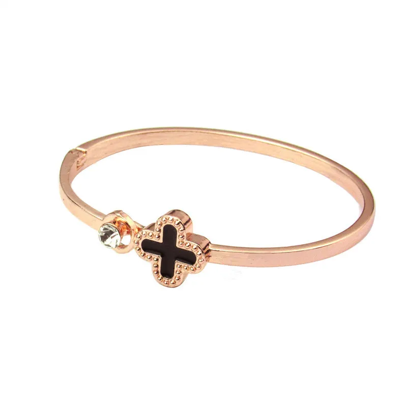 Koreaanse versie van mode-geometrie Lucky Klavertje-vier Designer armband Rose gouden handring voor dames temperament Opening handaccessoires