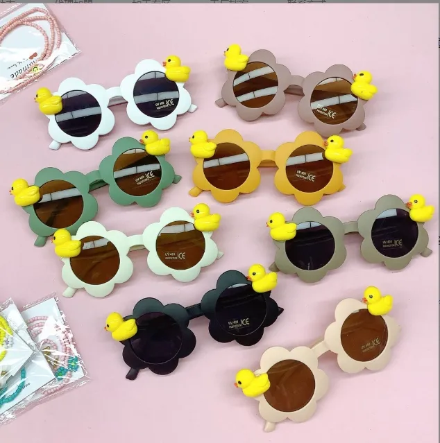 Nowe dzieci okulary przeciwsłoneczne okrągłe kwiaty okulary przeciwsłoneczne dla dziewcząt chłopcy żółte kaczka śliczne dziecięce foto
