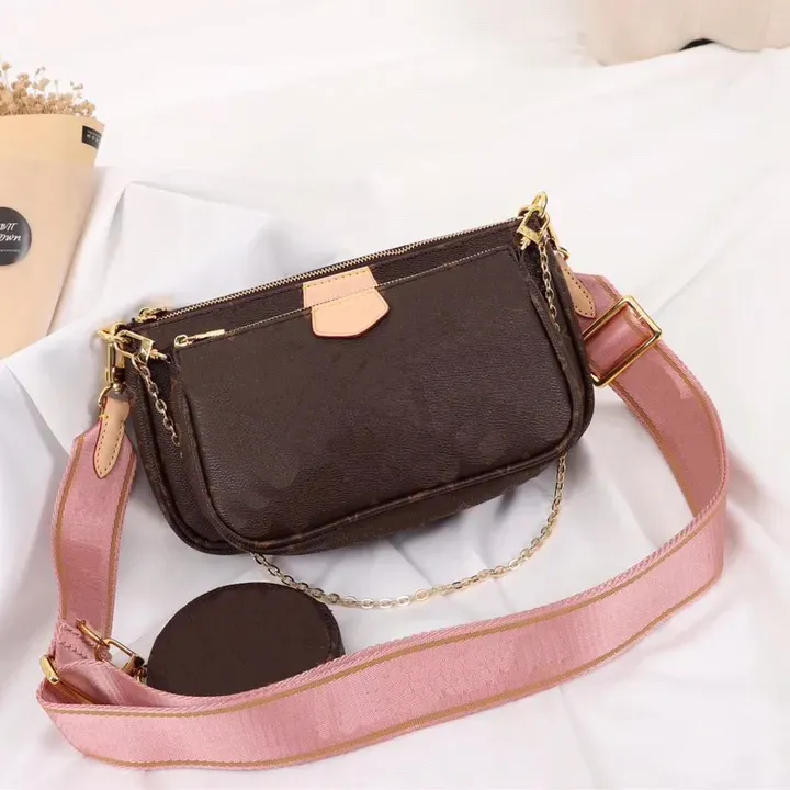 Ny designerväska lyxiga kvinnor axelväskor handväska designer crossbody plånbok kvinnliga purses toppkvalitet hög kapacitet brev blomma mahjongbag