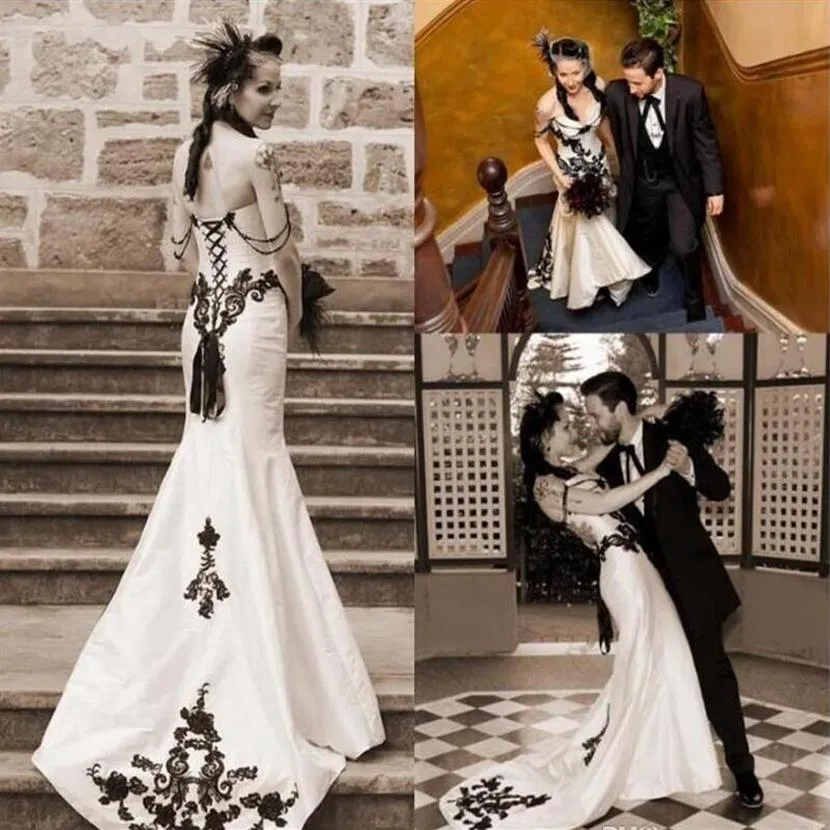 Nya vintage vita och svarta sjöjungfru bröllopsklänningar elegant spets applikation pärlstav bröllop brudklänningar mantel de mariage trädgård weddi206j