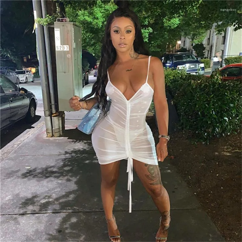 women in see through dresses