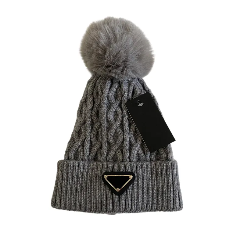 Designer Femmes Hiver Tricoté Chapeau De Laine Femmes Chunky Tricot Épais Chaud Fausse Fourrure Pom Bonnets Chapeaux Femme Bonnet Bonnet Bonnet Crâne Casquettes