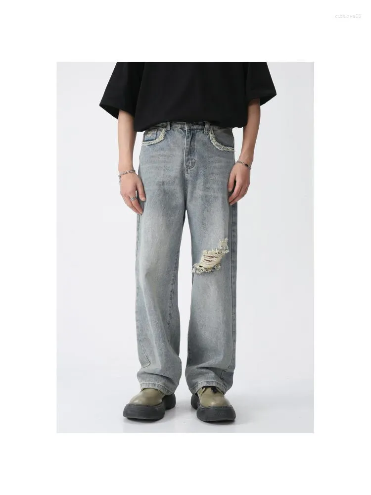 Mäns jeans 2023 Spring och Autumn Korean Style Straight American Trend of Broken Holes in the Casual Solid Color Denim Pants