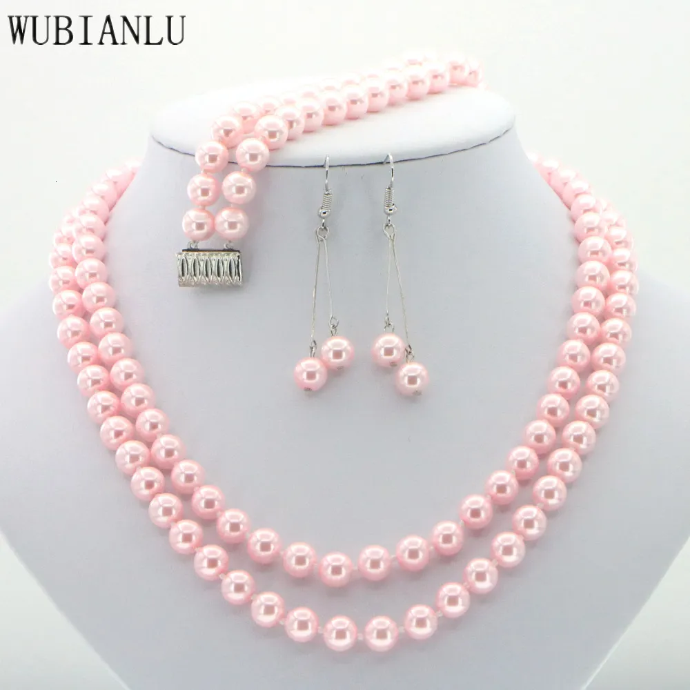 Ensembles de bijoux de mariage Femmes Mode 2 rangées 8mm Rose Mer du Sud Shell Collier de perles Bacelet Boucles d'oreilles Ensemble AAA Grade Vente en gros et au détail 230818