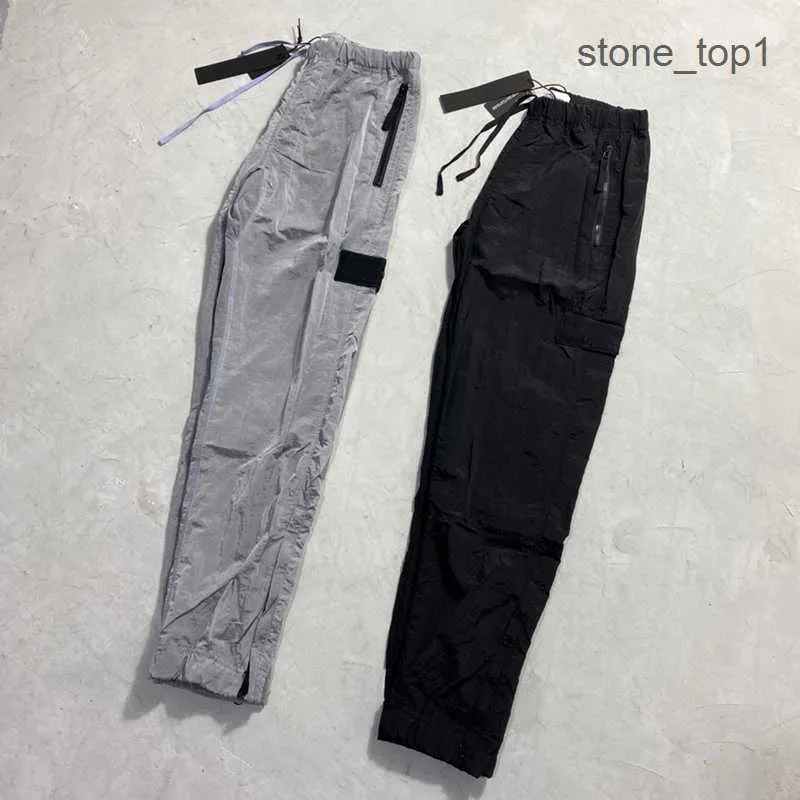 Pantaloni di marca Pantaloni pietra metallo nylon tasca distintivo pantaloni casual sottile riflettente taglia M-2xl pietre isola cargo 5GRR
