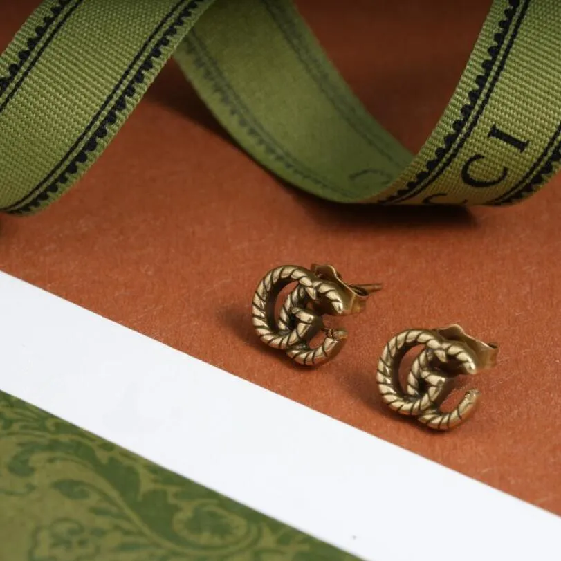 Orecchini di design per donna con lettera G di stile di lusso in acciaio al titanio Orecchini per coppia di moda senza