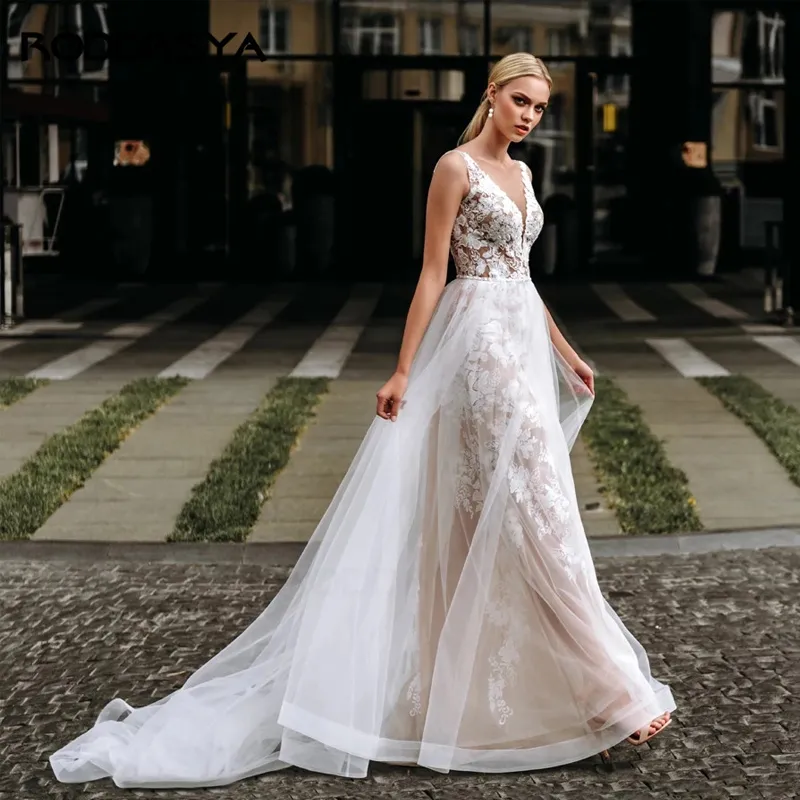 Abiti da sposa senza schienale in tulle bianco champagne con applicazioni di pizzo floreale Abito da sposa per perline da sposa Abito da sposa a linea