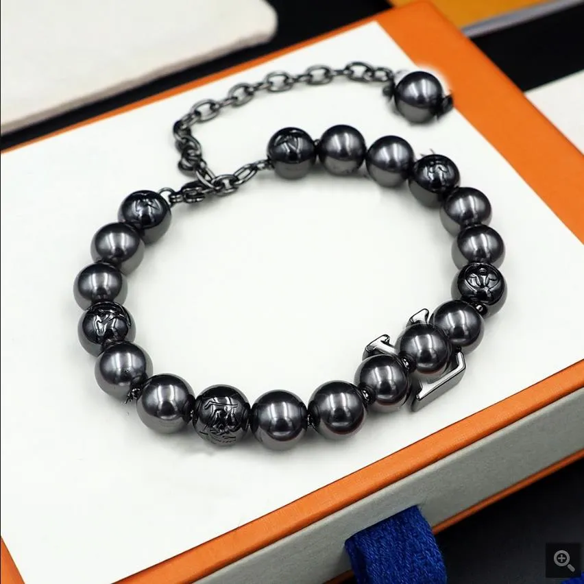 Nouveau design de bijoux en acier titane lettre V perles noires chaîne collier boucle d'oreille de mode Bracelet bijoux de créateur LV019601