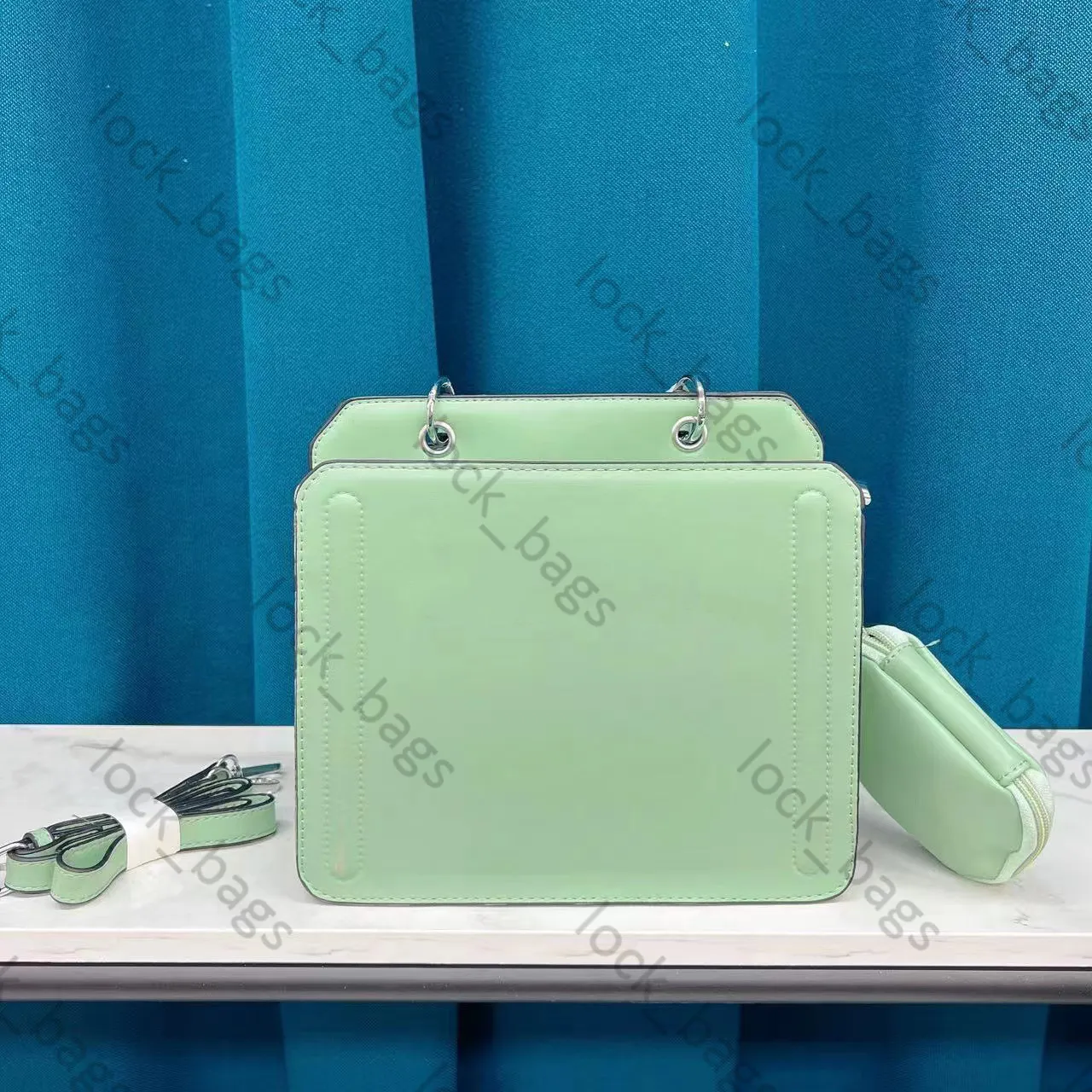 Mint green designer bag hotsell