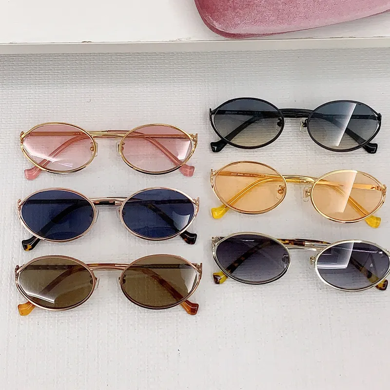 DHgate.com:Creative Metal Designer Sunglasses for Women