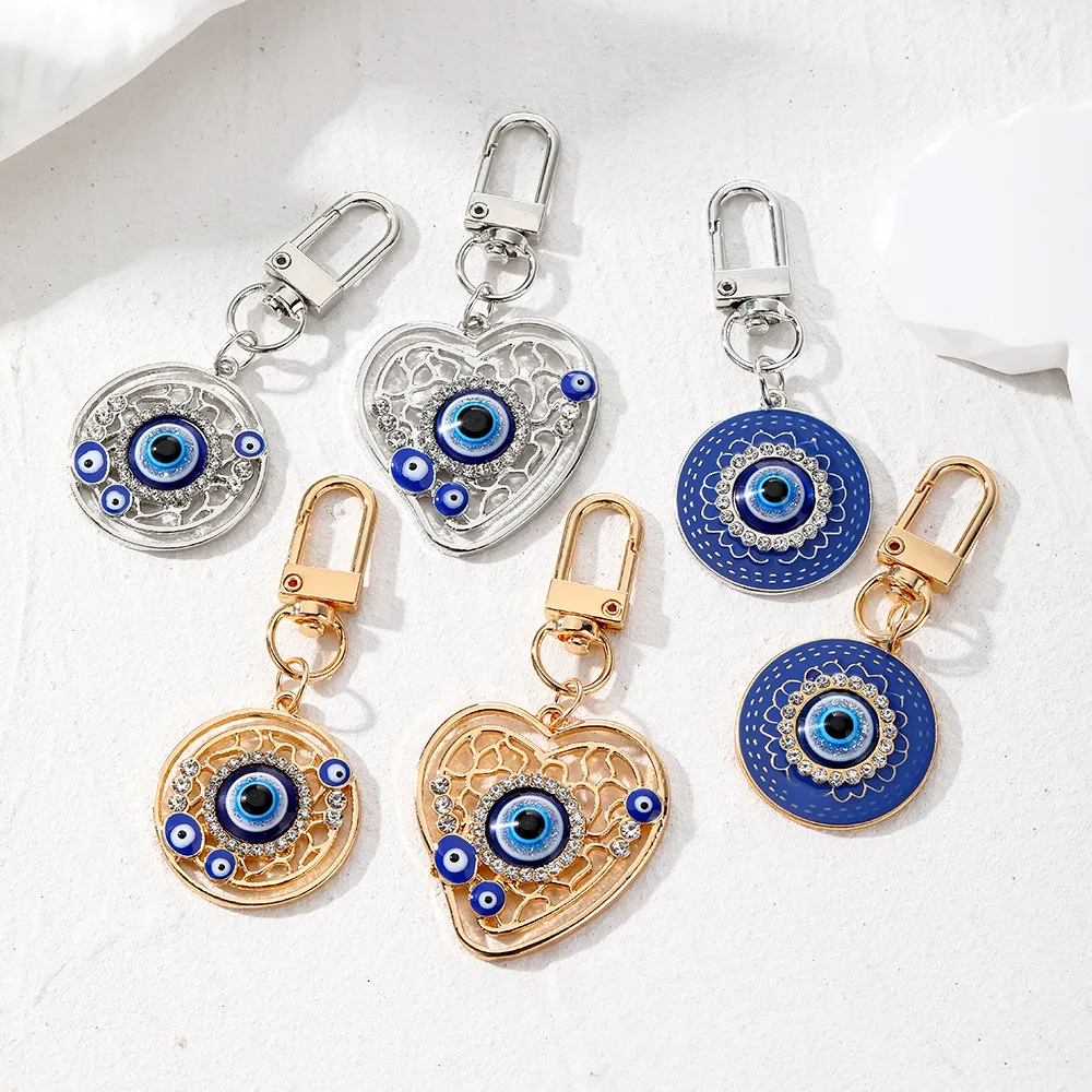 S3784 Modeschmuck Harz Evil Eye Anhänger Schlüsselanhänger aushöhlen geometrisches rundes Herz Strass blaue Augen Schlüsselanhänger