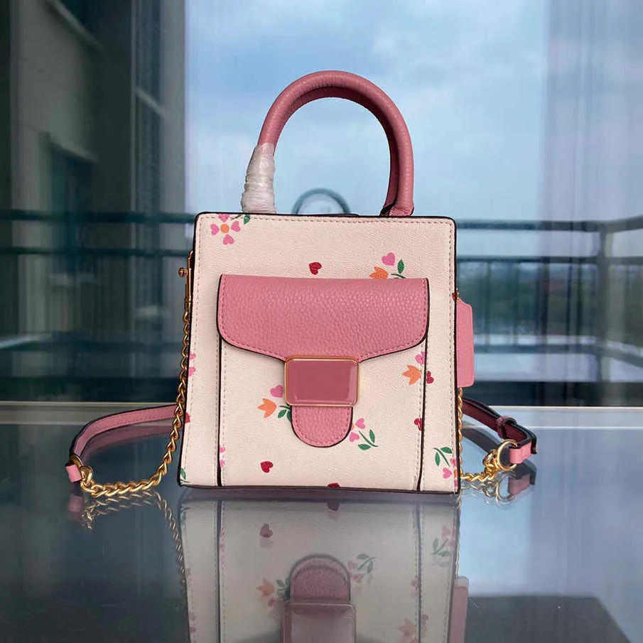 coabg läder axelväskor designer handväska kvinna damer totes handväskor förföljer litet tote modemärke crossbody rosa blommor hjärttryck 230207