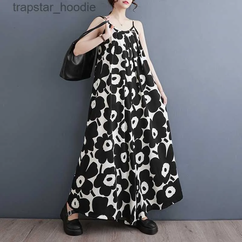 Kvinnors jumpsuits Rompers #6633 Black Backless Spaghetti Strap Jumpsuits Women Lose Thin Printed Sleeveless Wide Leg Jumpsuits Femme Sexy Overalls Summer L230921