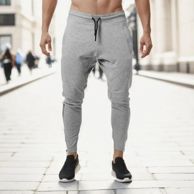 Męskie spodnie męskie solidne kolory fitness elastyczne talia sportowe rajstopy szczupłe spodnie siłownia jogging na zewnątrz modne dno