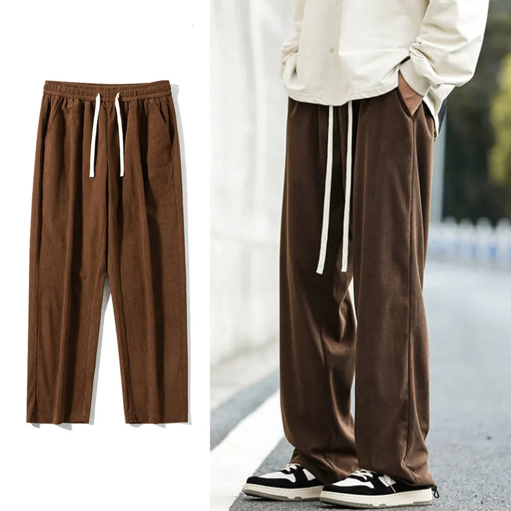 Męskie spodnie luźne brązowe sztruksowe mężczyźni kobiety wiosna jesień miękki styl koreański stały kolor prosty szerokopasmowe spodnie dresowe man 230921
