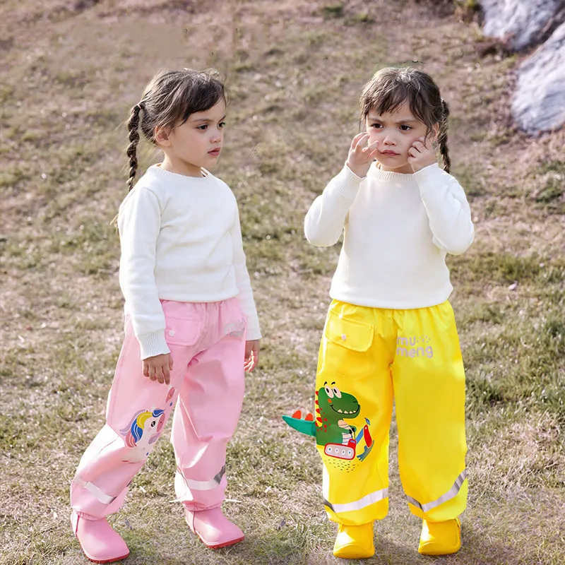 Impermeables impermeables niñas niños pantalones niños pequeños niños lluvia a prueba de viento pantalones de barro dibujos animados dinosaurio unicornio niños 230920