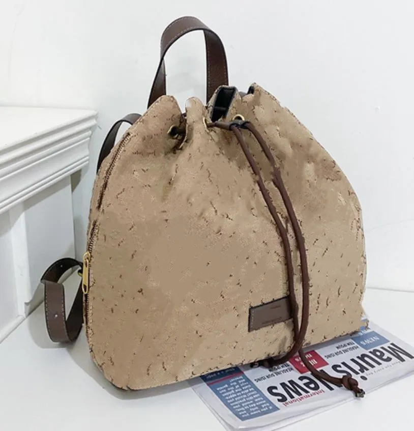 All Match Backpack Bucket Bag Full Label Letter Large Capacity Schoolbag Pull Belt Men And Women Same Style Casual Bags From 26 95 DHgate