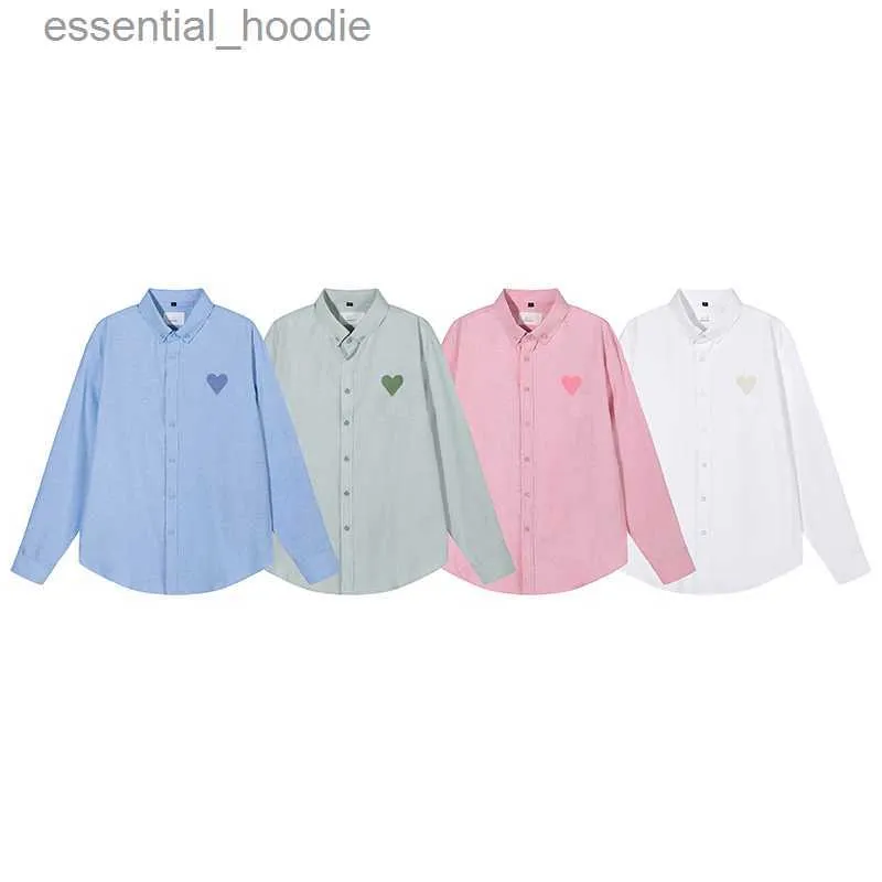 Herrklänningskjortor 2023 Summer Men Women Single-Breasted Shirt Heart Embroidered Polyester Lapel Buttons Långärmad solid Par Casual Shirts L230921