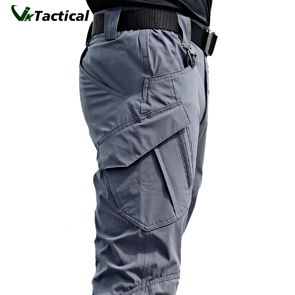Mäns byxor Mens Tactical Pants Flera fickelasticitet Militär Urban Tacitcal byxor Män Slim Fat Cargo Pant 5xl 230920