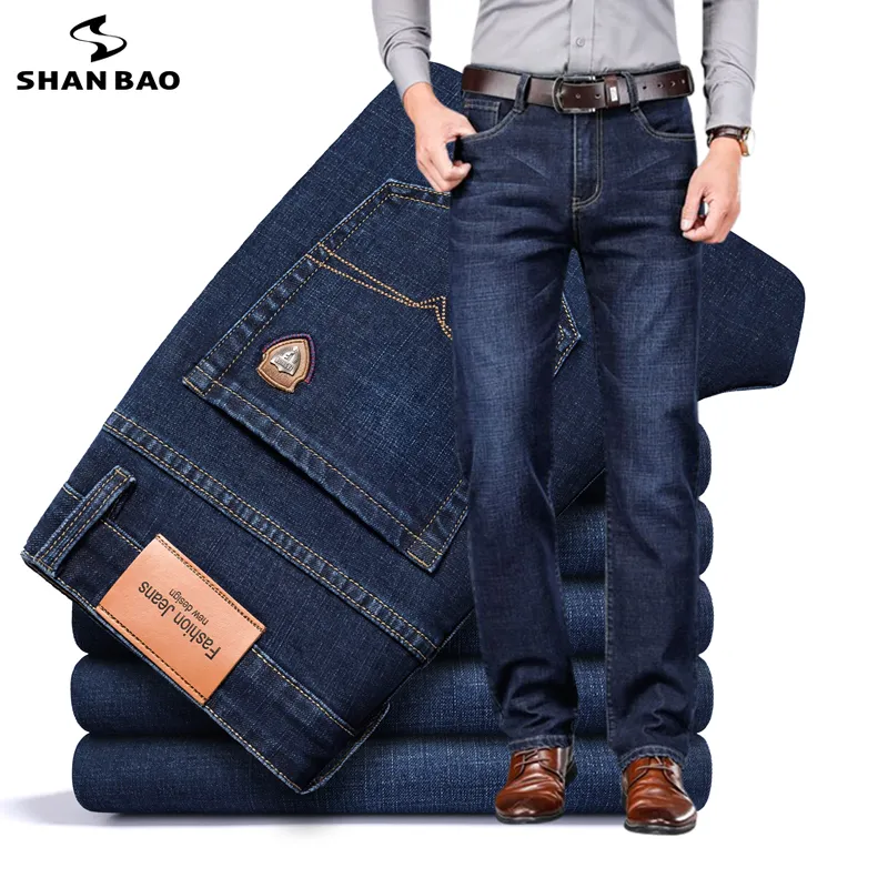 Mens Jeans SHAN BAO autumn spring fitted straight stretch denim jeans classic style badge youth mens business casual trousers 230922