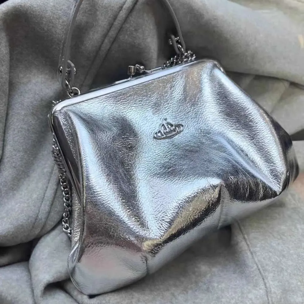 Western Empress Vivians Dowager Silver Advanced New Chinese Saturn Foreign Style Crossbody Handheld Clip Bag Silver Bag Women's New Style