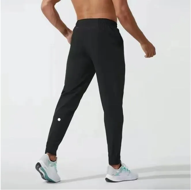 Yoga Pants LL Herr Jogger Long Pants Sport Yoga Outfit snabb torrt dragkammare Gymfickor Sweatpants Byxor Mens Casual Elastic Midje Fitness