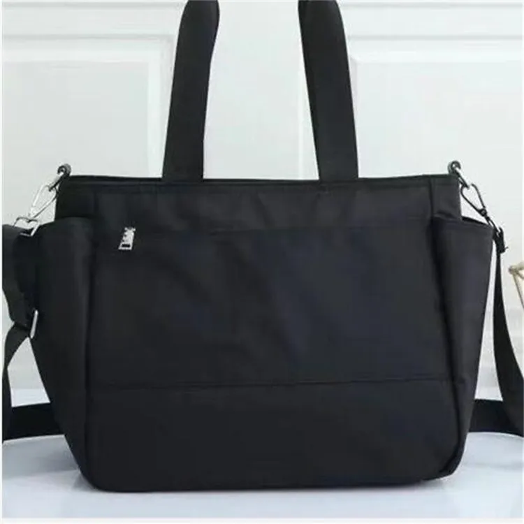 Borse pannolini firmate Mamma Baby Borsa pannolini impermeabile di grande capacità Mummia Maternità Viaggio Borsa allattamento Zaino con cerniera Set di tre pezzi di moda