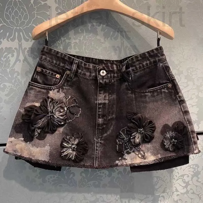 Kjolar lyxiga23 sommar kvinnor designer a-line denim mini kjol med brev mönster flickor kvinnliga vintage milan runway märke high end anpassad pärla